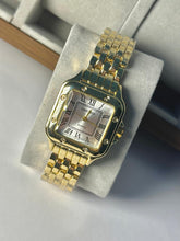 Cartier in gold in white